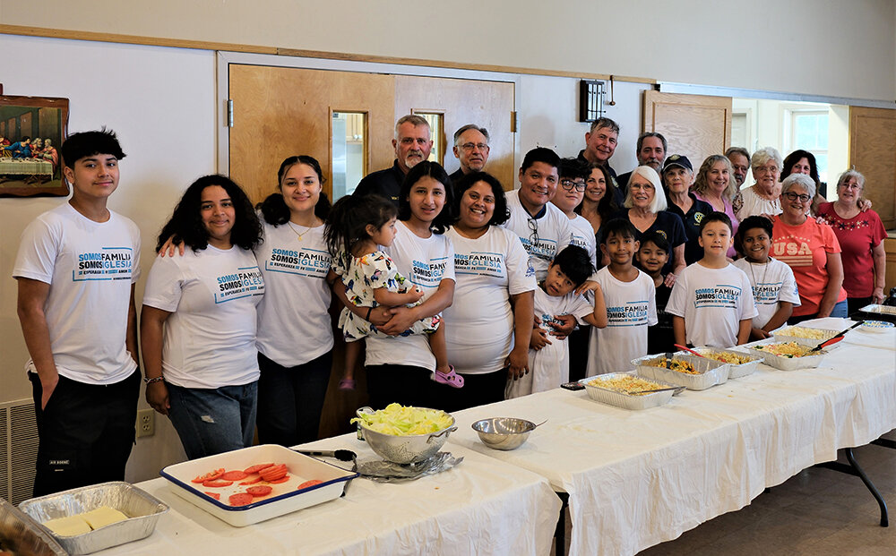 Pictured are all of the volunteers who helped to make the Veterans Lunch a success: in white T-shirts are members of Iglesia De Dios (Church of God) in Plattekill and standing in the back row, center and right, is William Farrell, Paul Daniels, Anita Diamontes, Chris Dawes, Diane Sterling, Joe Egan, Sue Surprise, Carrol Peets, James Fazio, Sis Morse, Maryanne DePew, Gina Coppola and Annette Laskowski